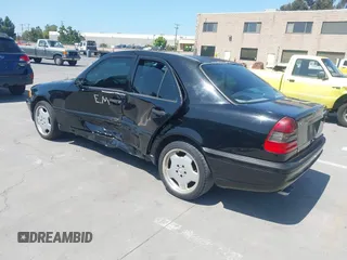 1999 Mercedes-Benz C with VIN WDBHA33G3XF889442, listed as a IAAI auction lot 42403800 with 82,075 mi miles and . Bid and sale history available at DreamBid. Image 3.