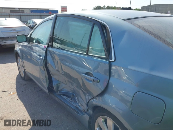 2007 Toyota Avalon XL with VIN 4T1BK36B97U227246, listed as a IAAI auction lot 42008300 with 119,930 mi miles. Bid and sale history available at carsss.com. Image 13.