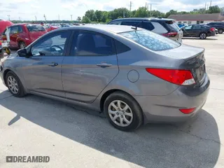2014 Hyundai Accent GLS with VIN KMHCT4AE4EU661497, listed as a IAAI auction lot 41987134 with 129,508 mi miles. Bid and sale history available at carsss.com. Image 3.