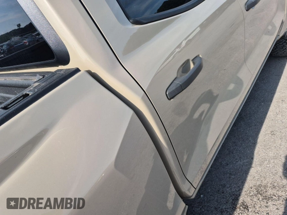 2023 Chevrolet Colorado 4WD Work Truck with VIN 1GCGTBEC8P1195130, listed as a IAAI auction lot 42854423 with 80,886 mi miles and . Bid and sale history available at DreamBid. Image 3.