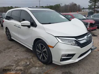 2018 Honda Odyssey Elite with VIN 5FNRL6H90JB064823, listed as a IAAI auction lot 41510216 with NaN miles. Bid and sale history available at carsss.com. Image 1.