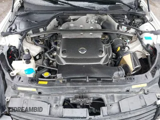 2004 Infiniti G35 Coupe w/Leather with VIN JNKCV54E34M824444, listed as a IAAI auction lot 41984306 with 165,293 mi miles. Bid and sale history available at carsss.com. Image 10.