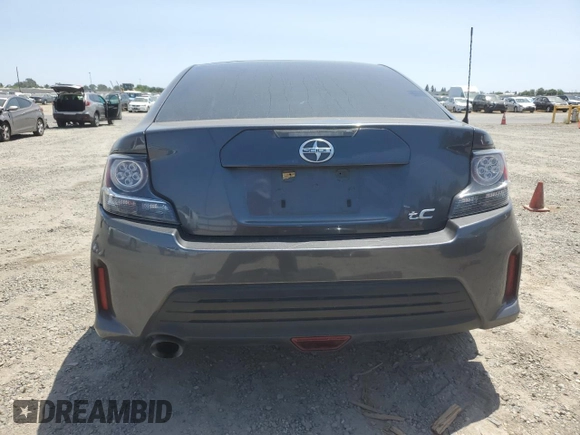 2015 Scion tC z VIN JTKJF5C76FJ010813, wystawiony jako Copart lot #58987575 z przebiegiem 108 709 mil mil oraz Szkoda całkowita • Salvage title. Historia ofert i sprzedaży dostępna na DreamBid. Obrazek 6.