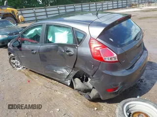 2019 Ford Fiesta SE z VIN 3FADP4EJ9KM125252, wystawiony jako IAAI lot #42221622 z przebiegiem 57 366 mil mil oraz . Historia ofert i sprzedaży dostępna na DreamBid. Obrazek 3.