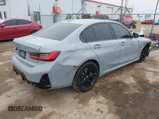 2023 BMW 3 Series 330e with VIN 3MW39FF00P8D57706, listed as a IAAI auction lot 41560259 with 1 mi miles. Bid and sale history available at carsss.com. Image 4.