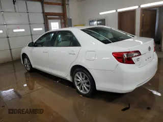 2012 Toyota Camry L with VIN 4T4BF1FK2CR246116, listed as a Copart auction lot 84895524 with 75,244 mi miles and Salvage Title. Bid and sale history available at DreamBid. Image 2.