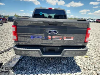 2021 Ford F-150 XL with VIN 1FTEW1CP1MFB85228, listed as a Copart auction lot 61338555 with Not provided miles and Salvage title. Bid and sale history available at DreamBid. Image 6.