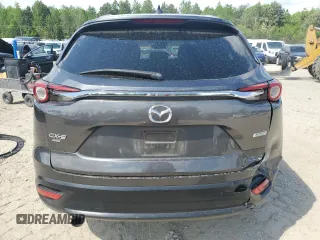 2018 Mazda CX-9 Sport с VIN JM3TCBBY8J0212592, выставлен на аукционе Copart как лот 54555875 с пробегом 124 684 миль миль и Списание • Salvage title. История ставок и продаж доступна на DreamBid. Изображение 6.
