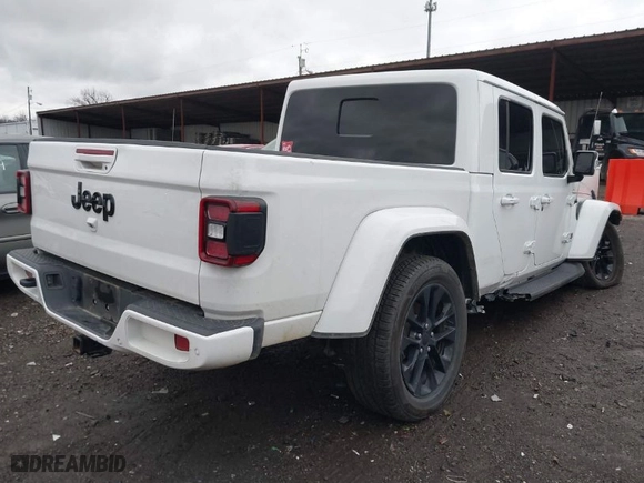 2022 Jeep Gladiator Overland with VIN 1C6HJTFG7NL105864, listed as a IAAI auction lot 41031684 with 56,088 mi miles. Bid and sale history available at carsss.com. Image 4.