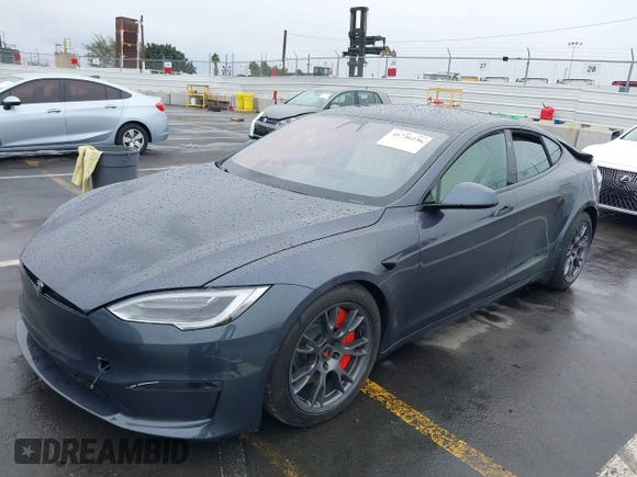 2022 Tesla Model S with VIN 5YJSA1E52NF459460, listed as a IAAI auction lot 41736236 with Not Provided miles and . Bid and sale history available at DreamBid. Image 20.