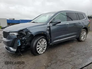 2020 Cadillac XT6 AWD Premium Luxury with VIN 1GYKPDRS3LZ130686, listed as a Copart auction lot 57419795 with 74,038 mi miles and Clean title. Bid and sale history available at DreamBid. Image 1.