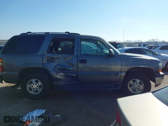 2002 Chevrolet Tahoe LT with VIN 1GNEC13Z12J233208, listed as a IAAI auction lot 41659873 with 238,922 mi miles and . Bid and sale history available at DreamBid. Image 13.