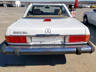 1987 Mercedes-Benz 560 SL with VIN WDBBA48D8HA068748, listed as a Copart auction lot 46874285 with 58,817 mi miles and Clean Title. Bid and sale history available at DreamBid. Image 6.