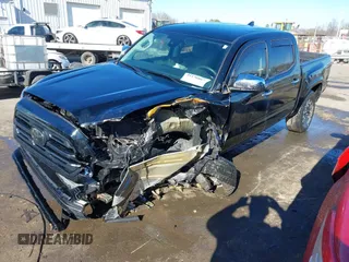 2018 Toyota Tacoma SR with VIN 5TFCZ5ANXJX124991, listed as a IAAI auction lot 41136867 with 57,980 mi miles and . Bid and sale history available at carsss.com. Image 17.