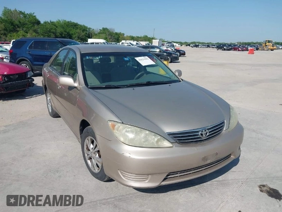 2006 Toyota Camry STD with VIN 4T1BE30K76U704819, listed as a IAAI auction lot 42021982 with 264,934 mi miles and . Bid and sale history available at carsss.com. Image 1.