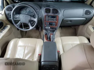 2004 Oldsmobile Bravada z VIN 1GHDT13S342224699, wystawiony jako Copart lot #71546144 z przebiegiem 36 549 mil mil oraz Tytuł czysty. Historia ofert i sprzedaży dostępna na DreamBid. Obrazek 8.