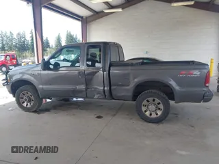 2003 Ford Super Duty F-250 XL with VIN 1FTNX21F33EA22565, listed as a IAAI auction lot 42004045 with 252,604 mi miles. Bid and sale history available at carsss.com. Image 14.