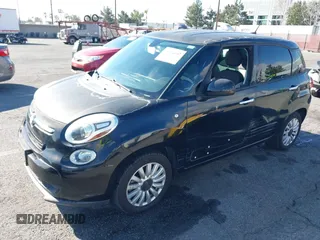 2014 FIAT 500L Easy with VIN ZFBCFABH6EZ001258, listed as a IAAI auction lot 41354892 with 67,852 mi miles and . Bid and sale history available at DreamBid. Image 2.