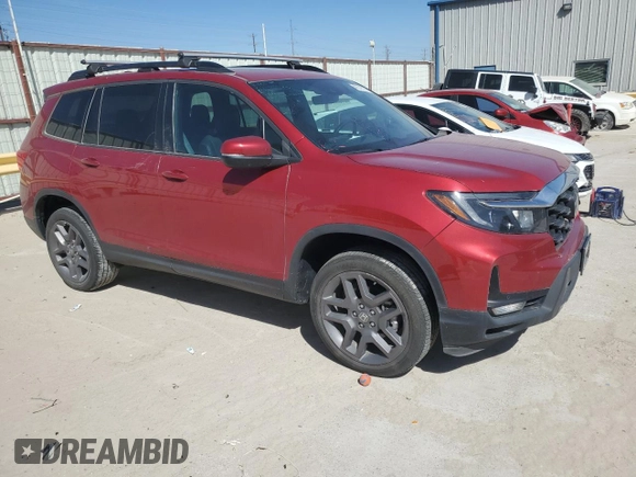 2023 Honda Passport EX-L with VIN 5FNYF8H57PB007264, listed as a Copart auction lot 48942955 with 18,013 mi miles and Salvage Title. Bid and sale history available at DreamBid. Image 4.