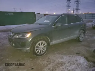 2016 Volkswagen Touareg Sport with VIN WVGEF9BP2GD005296, listed as a Copart auction lot 88808735 with 133,429 mi miles and Salvage Title. Bid and sale history available at DreamBid. Image 1.