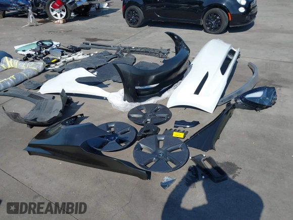 2023 Tesla Model 3 with VIN 5YJ3E1EA9PF585632, listed as a IAAI auction lot 40520993 with 7,775 mi miles and . Bid and sale history available at DreamBid. Image 23.