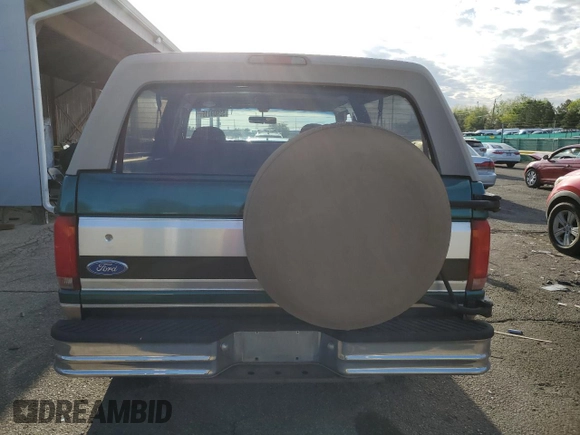 1996 Ford Bronco Custom with VIN 1FMEU15H4TLB59116, listed as a Copart auction lot 52989015 with 210,464 mi miles and Salvage title. Bid and sale history available at DreamBid. Image 6.