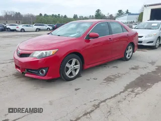 2014 Toyota Camry L with VIN 4T1BF1FK1EU758494, listed as a IAAI auction lot 42127661 with 242,112 mi miles. Bid and sale history available at carsss.com. Image 2.