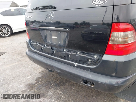 2005 Mercedes-Benz M 500 with VIN 4JGAB75EX5A532297, listed as a IAAI auction lot 42794563 with 200,481 mi miles and . Bid and sale history available at DreamBid. Image 13.