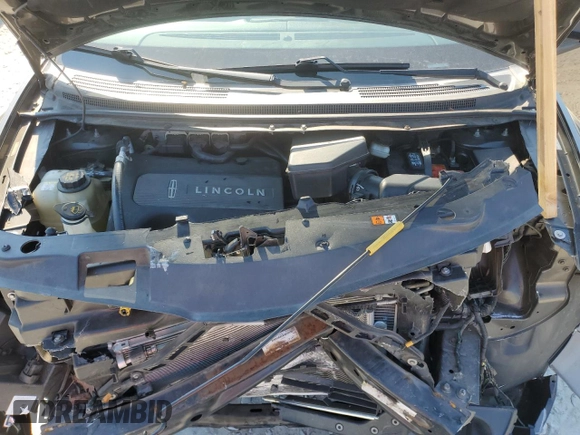 2011 Lincoln MKX z VIN 2LMDJ6JK8BBJ13892, wystawiony jako Copart lot #88861145 z przebiegiem 203 765 mil mil oraz Szkoda całkowita • Salvage title. Historia ofert i sprzedaży dostępna na DreamBid. Obrazek 11.