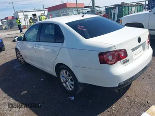 2008 Volkswagen Jetta Sedan S with VIN 3VWJZ71K68M119423, listed as a IAAI auction lot 41942134 with 233,783 mi miles. Bid and sale history available at carsss.com. Image 3.