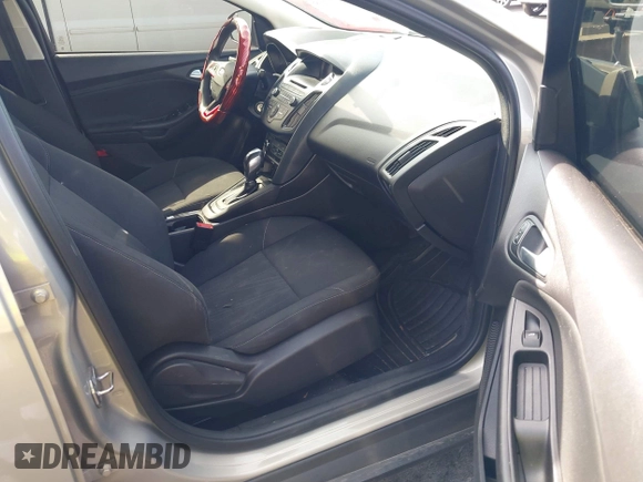 2015 Ford Focus SE z VIN 1FADP3F29FL206003, wystawiony jako IAAI lot #42187898 z przebiegiem 149 560 mil mil oraz . Historia ofert i sprzedaży dostępna na DreamBid. Obrazek 5.