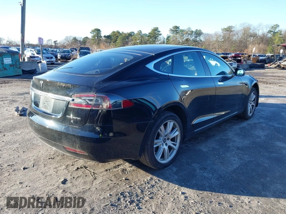 2020 Tesla Model S Long Range with VIN 5YJSA1E24LF413888, listed as a IAAI auction lot 41214903 with 42,711 mi miles and . Bid and sale history available at DreamBid. Image 4.