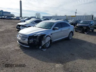 2014 Ford Taurus Limited with VIN 1FAHP2F86EG134779, listed as a IAAI auction lot 41660527 with 115,016 mi miles. Bid and sale history available at carsss.com. Image 18.