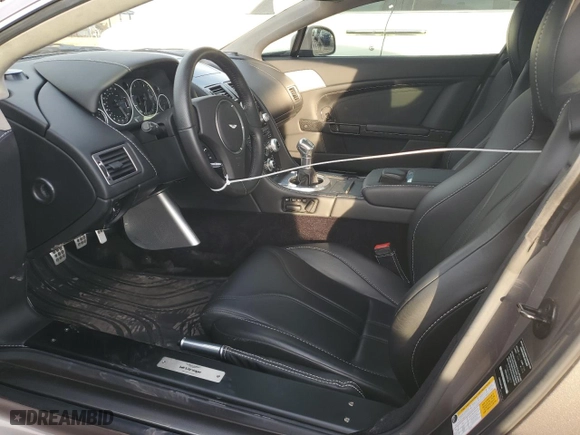 2011 Aston Martin V12 Vantage Carbon Black with VIN SCFEBBCF4BGS00791, listed as a Copart auction lot 76911374 with 8,207 mi miles and Salvage Title. Bid and sale history available at carsss.com. Image 7.
