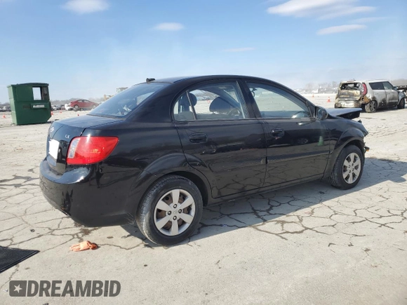 2010 Kia Rio LX with VIN KNADH4A3XA6652808, listed as a Copart auction lot 42597245 with 164,768 mi miles and Salvage Title. Bid and sale history available at carsss.com. Image 3.