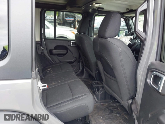 2020 Jeep Wrangler Unlimited Black and Tan with VIN 1C4HJXDG5LW187222, listed as a IAAI auction lot 42238194 with 9,237 mi miles and . Bid and sale history available at DreamBid. Image 8.