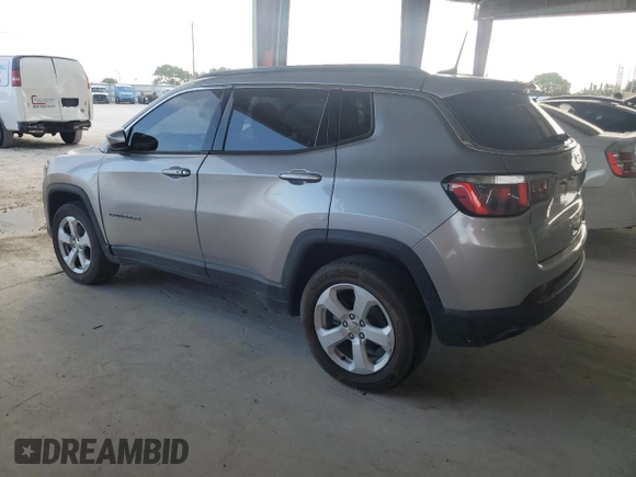 2019 Jeep Compass Altitude with VIN 3C4NJDBB3KT599863, listed as a Copart auction lot 57561965 with 72,482 mi miles and Salvage title. Bid and sale history available at DreamBid. Image 2.