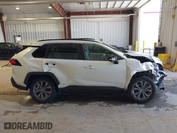 2024 Toyota RAV4 Hybrid XLE Premium with VIN 2T3B6RFV5RW081035, listed as a IAAI auction lot 41993266 with 12,159 mi miles. Bid and sale history available at carsss.com. Image 14.
