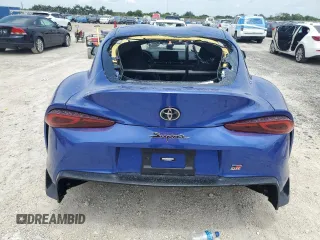 2023 Toyota Supra 3.0 with VIN WZ1DB0G08PW061526, listed as a Copart auction lot 61642655 with 11,279 mi miles and Salvage title. Bid and sale history available at DreamBid. Image 6.