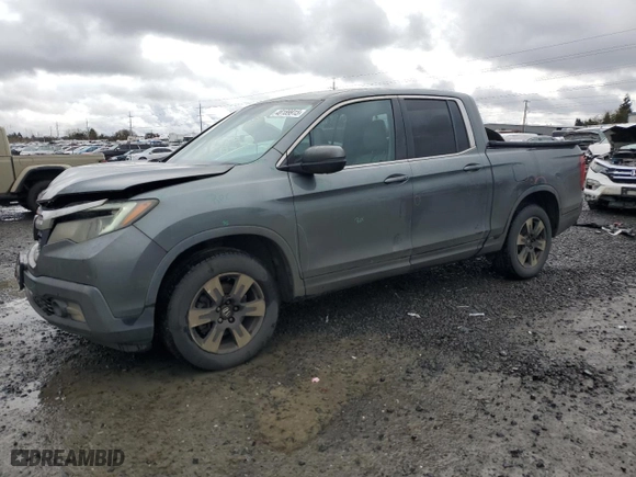 2017 Honda Ridgeline RTL-T with VIN 5FPYK3F69HB025784, listed as a Copart auction lot 48189915 with 164,176 mi miles and Salvage Title. Bid and sale history available at carsss.com. Image 1.