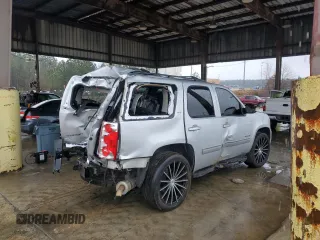 2014 GMC Yukon SLT with VIN 1GKS1CE0XER231558, listed as a Copart auction lot 89347705 with 207,511 mi miles and Salvage Title. Bid and sale history available at carsss.com. Image 3.