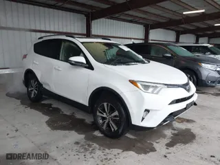 2018 Toyota RAV4 XLE with VIN JTMRFREV6JD222115, listed as a IAAI auction lot 41505367 with 118,126 mi miles. Bid and sale history available at carsss.com. Image 1.