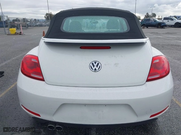 2013 Volkswagen Beetle Convertible 2.5L with VIN 3VW5P7AT9DM825439, listed as a IAAI auction lot 41760907 with 53,649 mi miles. Bid and sale history available at carsss.com. Image 16.