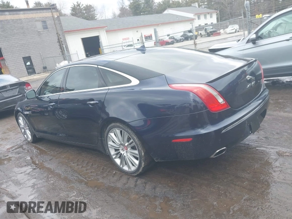 2015 Jaguar XJ Portfolio with VIN SAJWJ2GD0F8V83497, listed as a IAAI auction lot 41697285 with 52,311 mi miles and . Bid and sale history available at DreamBid. Image 14.