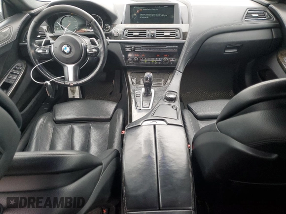 2015 BMW 6 Series 640i xDrive z VIN WBA6B8C55FD452972, wystawiony jako Copart lot #44559495 z przebiegiem 114 358 mil mil oraz Szkoda całkowita • Salvage title. Historia ofert i sprzedaży dostępna na DreamBid. Obrazek 8.