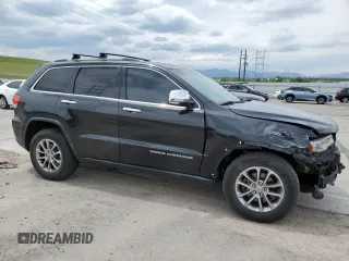 2014 Jeep Grand Cherokee Limited with VIN 1C4RJFBG0EC517032, listed as a Copart auction lot 58813355 with 173,616 mi miles and Salvage title. Bid and sale history available at DreamBid. Image 4.