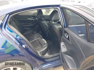 2016 Nissan Maxima S with VIN 1N4AA6AP4GC445341, listed as a IAAI auction lot 41890630 with 121,115 mi miles and . Bid and sale history available at DreamBid. Image 8.
