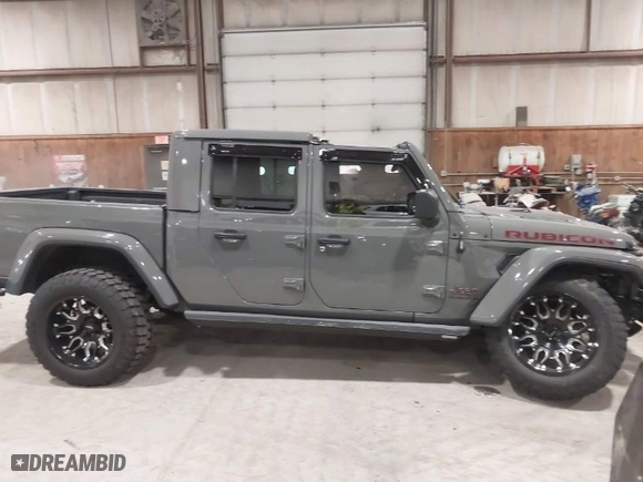 2020 Jeep Gladiator Rubicon with VIN 1C6JJTBG1LL214681, listed as a IAAI auction lot 41979666 with 23,811 mi miles. Bid and sale history available at carsss.com. Image 14.