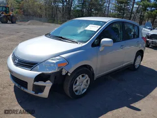 2012 Nissan Versa S with VIN 3N1BC1CP1CK269395, listed as a IAAI auction lot 42049078 with 129,091 mi miles. Bid and sale history available at carsss.com. Image 2.