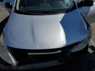 2013 Nissan Versa S Plus z VIN 3N1CN7AP2DL856494, wystawiony jako Copart lot #47130355 z przebiegiem 141 879 mil mil oraz Szkoda całkowita • Salvage title. Historia ofert i sprzedaży dostępna na DreamBid. Obrazek 13.